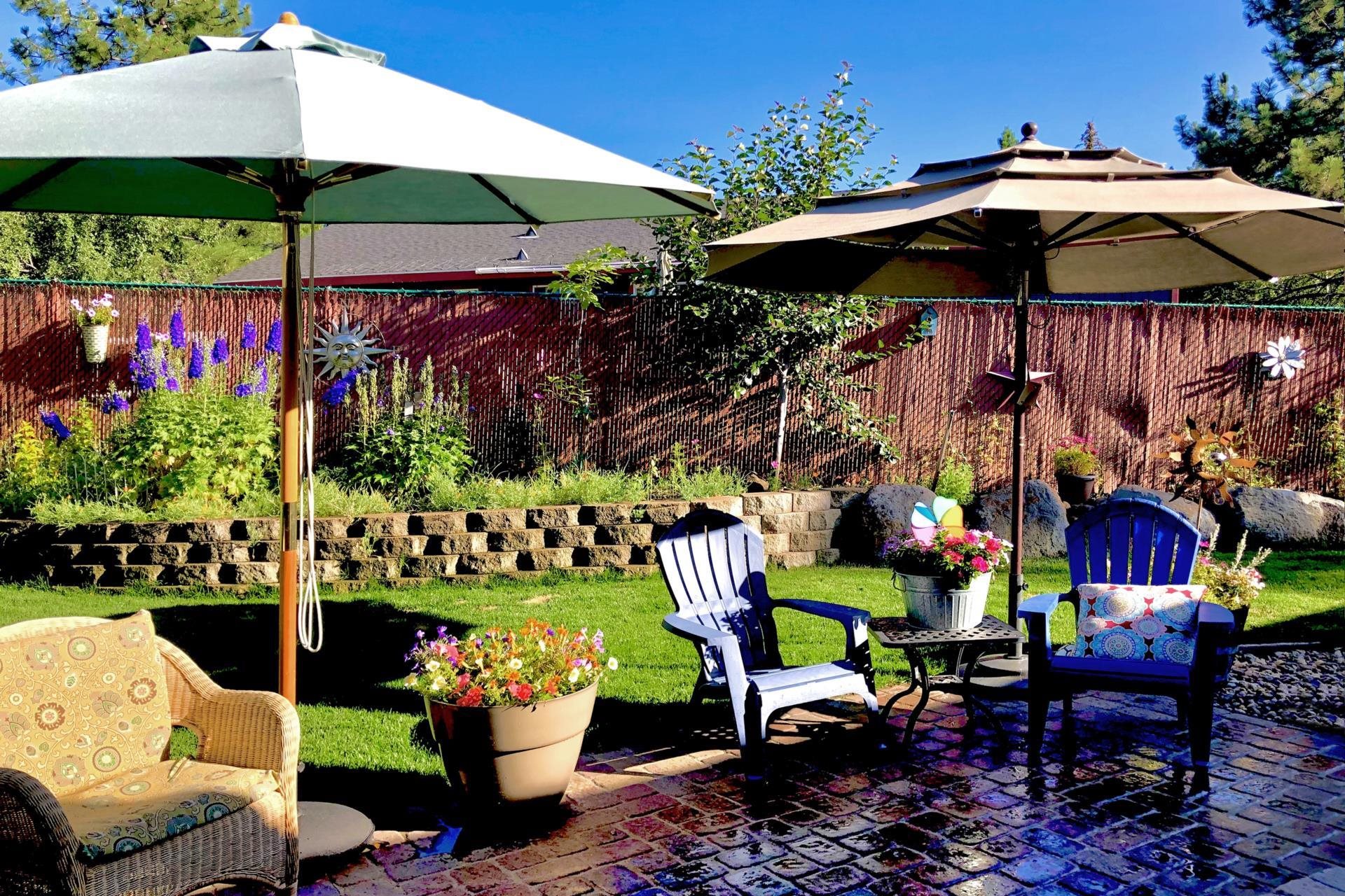 10383 Sugar Pine Road Truckee, CA 96161 - Photo 9 of 21 a view of a chairs and table under an umbrella in the patio