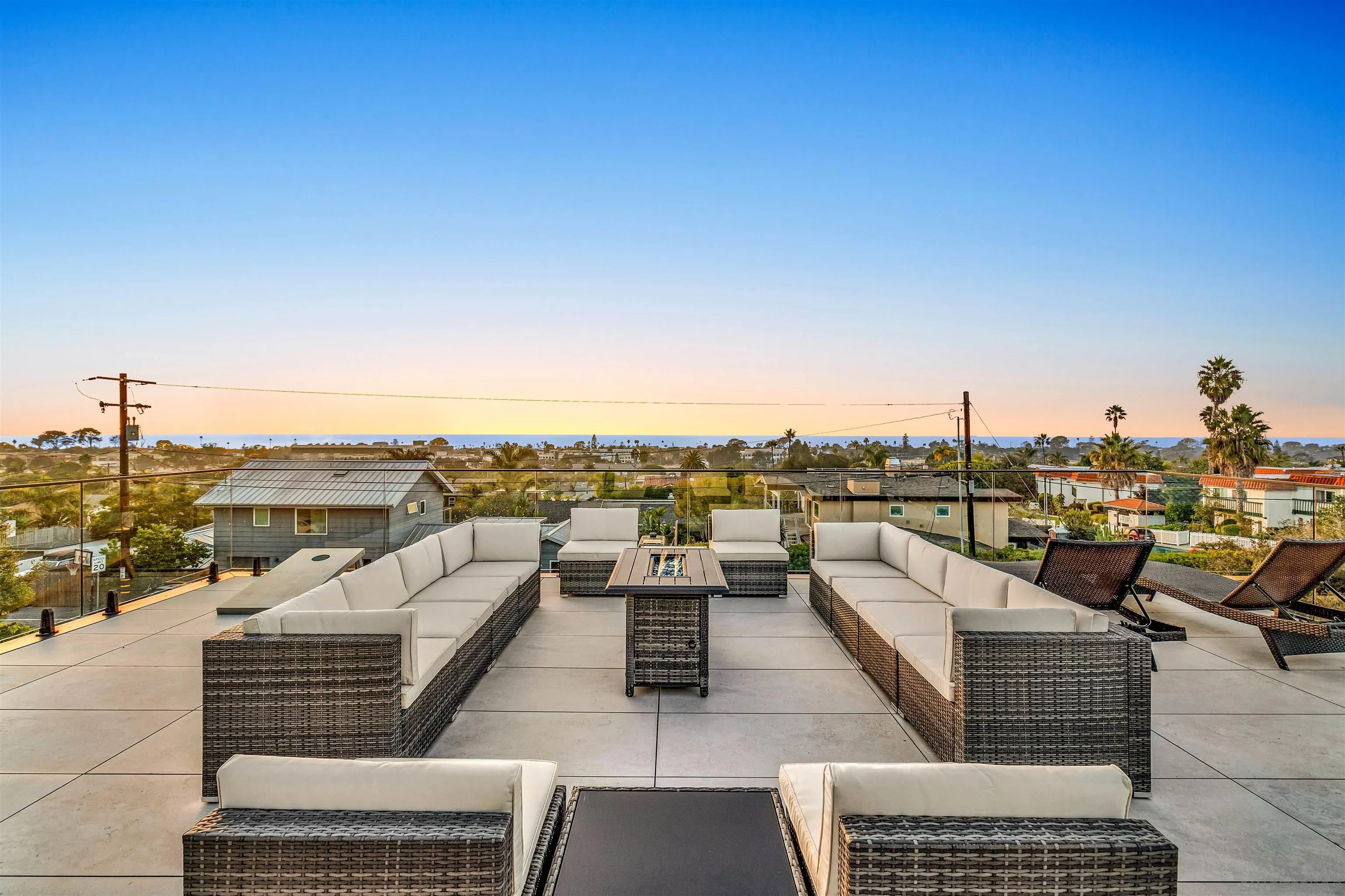 1009 Arcadia Road Encinitas, CA 92024 - Photo 2 of 37 a view of a terrace with couches and sky view