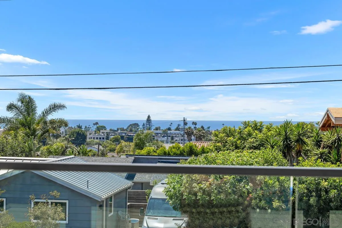 1009 Arcadia Road Encinitas, CA 92024 - Photo 21 of 37 a view of a city skyline from a balcony