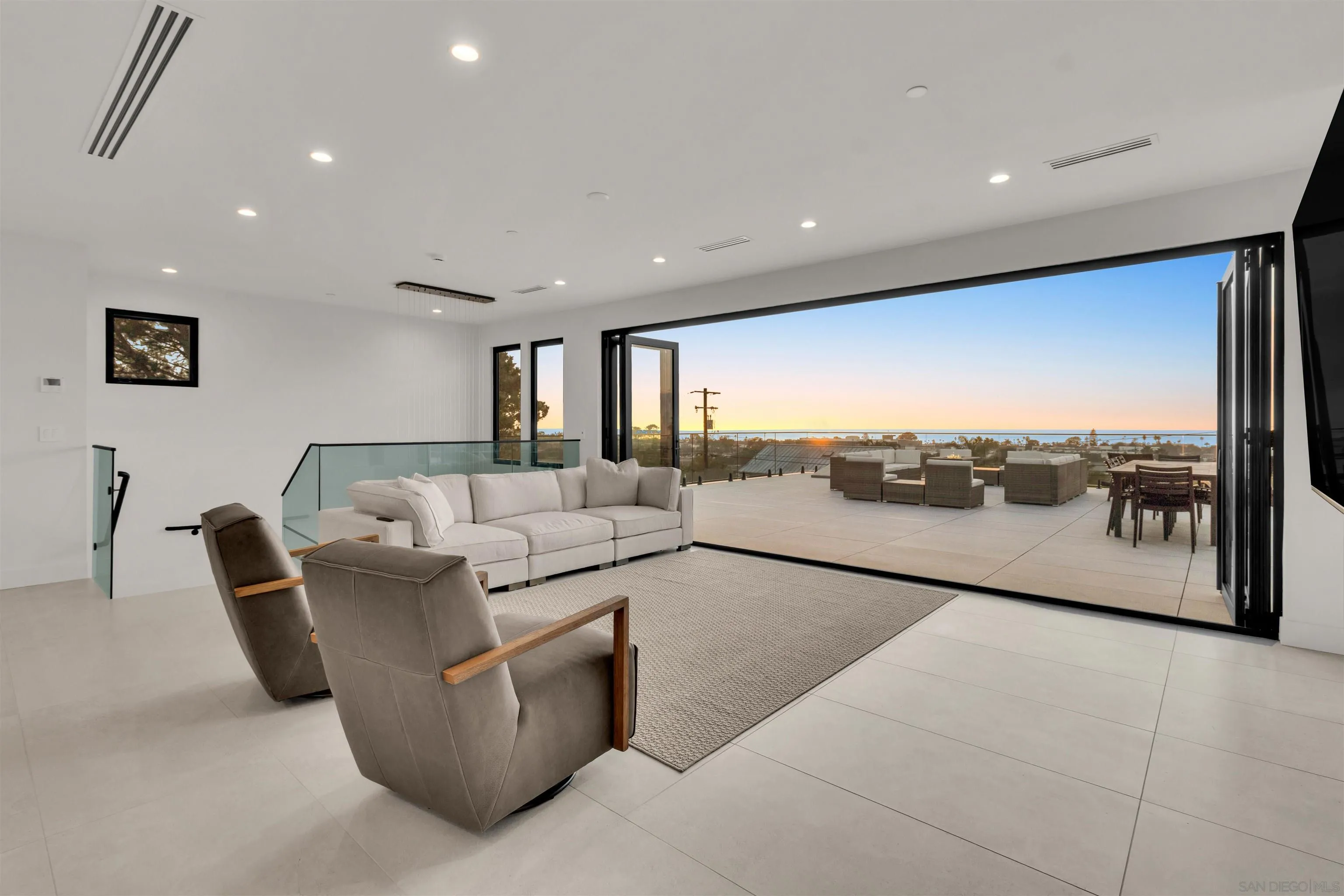 1009 Arcadia Road Encinitas, CA 92024 - Photo 5 of 37 a living room with furniture and a view of kitchen
