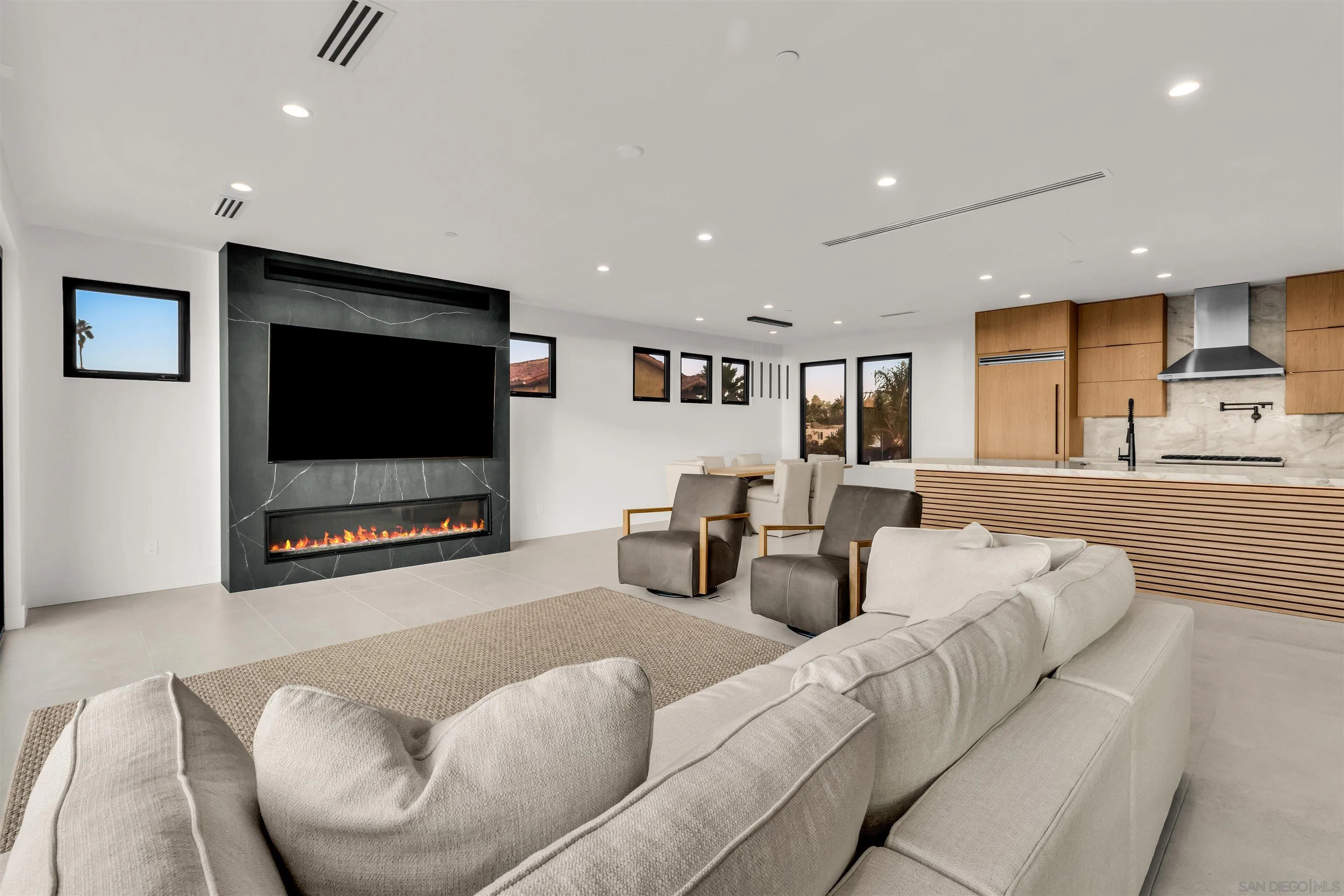 1009 Arcadia Road Encinitas, CA 92024 - Photo 8 of 37 a living room with furniture and a flat screen tv