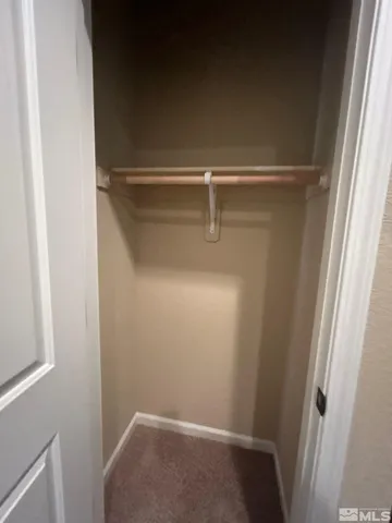 a view of small space with racks on the wall