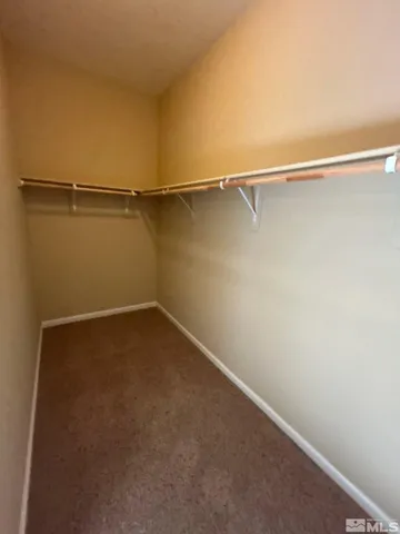 a view of small space with racks on the wall