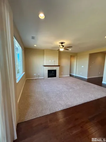 a view of a livingroom with a fireplace
