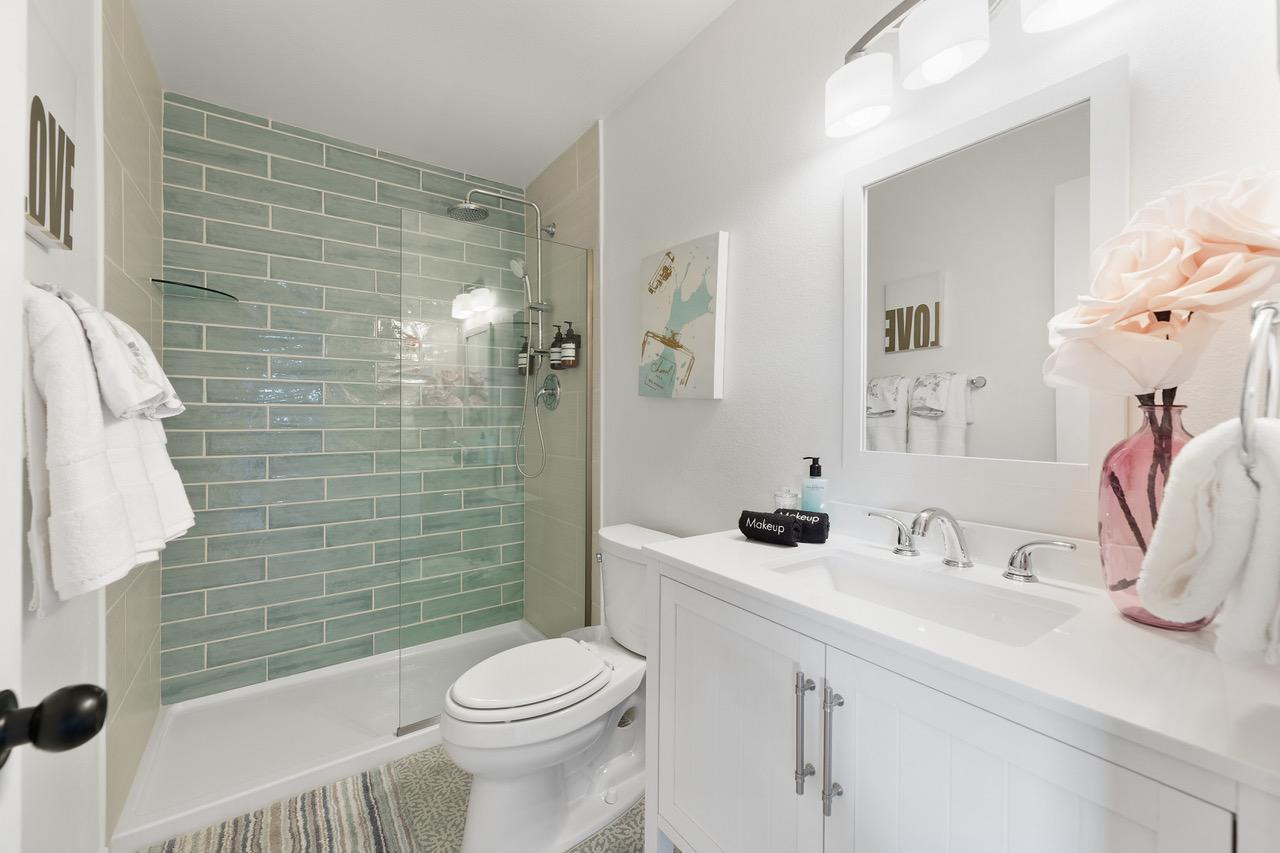 8307 East Arlington Road Scottsdale, AZ 85250 - Photo 15 of 25 a bathroom with a sink a toilet and shower