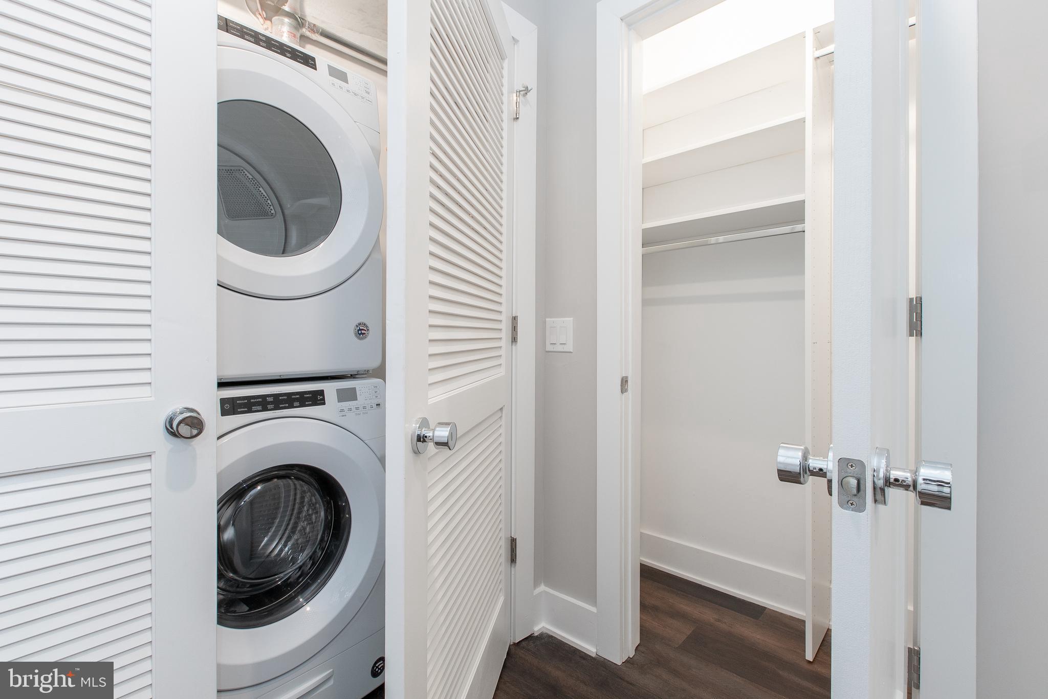 45 West Haines Street, Unit 303 Philadelphia, PA 19144 - Photo 20 of 24 a view of a hallway with washer and dryer