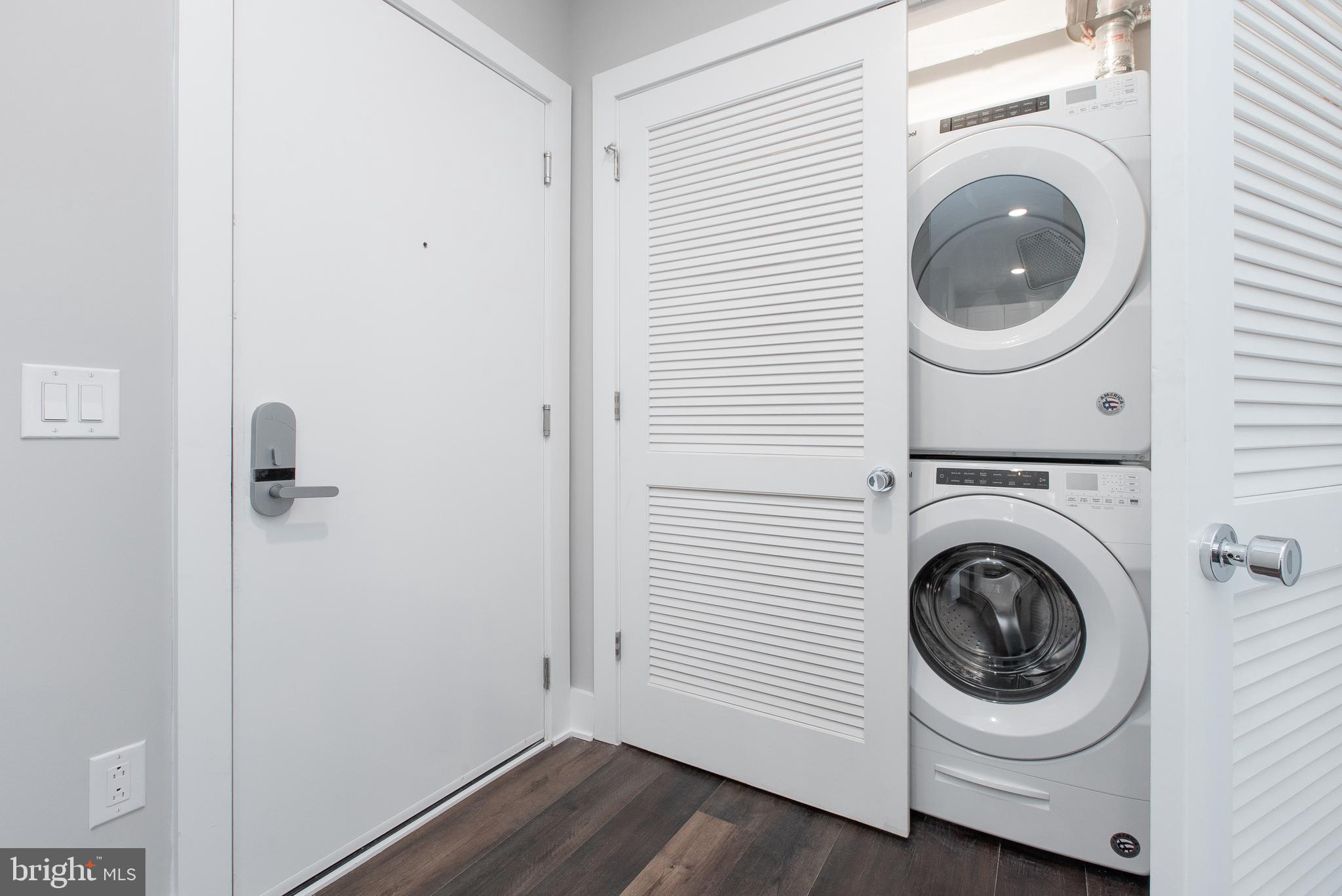 45 West Haines Street, Unit 303 Philadelphia, PA 19144 - Photo 21 of 24 a utility room with dryer and washer