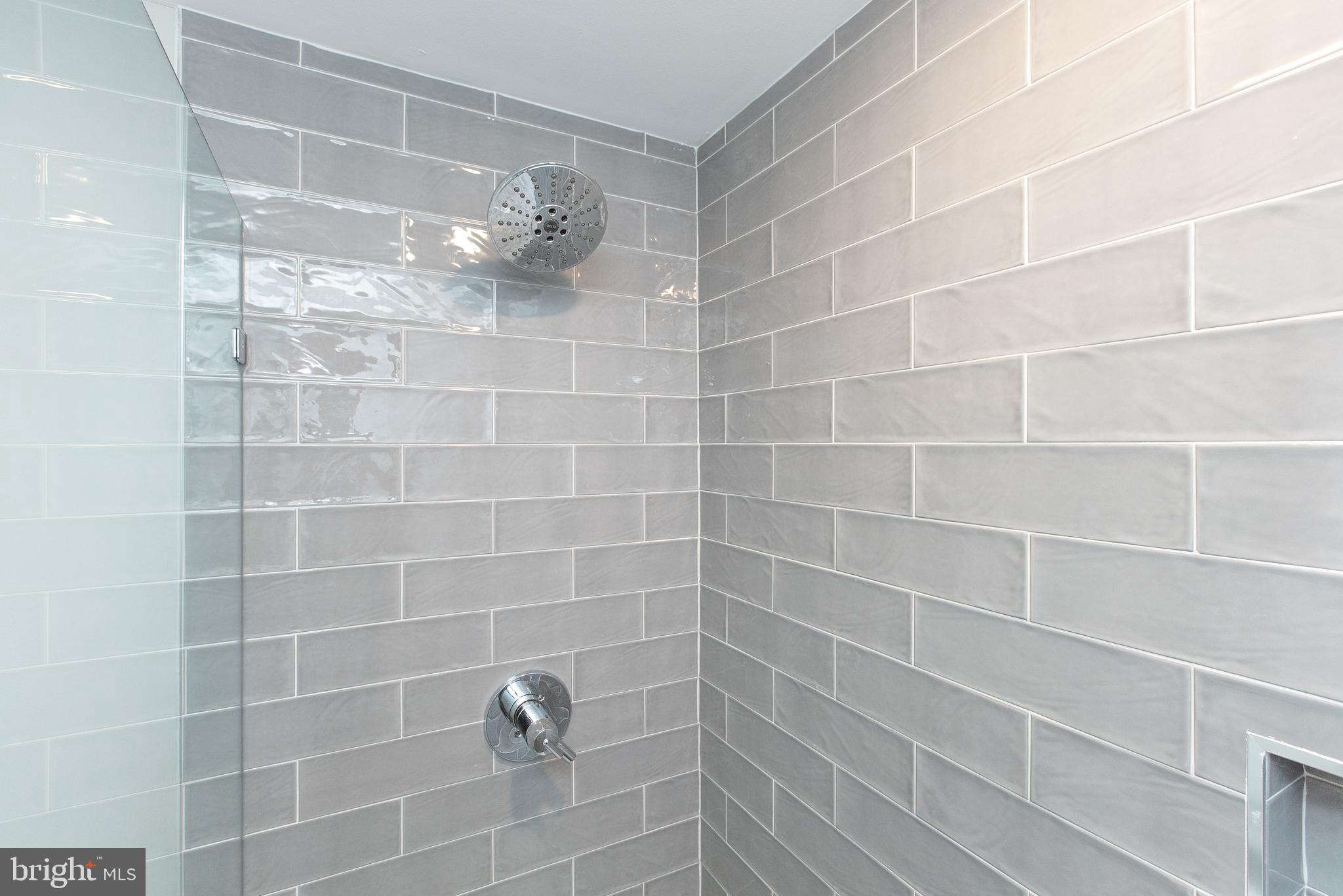 45 West Haines Street, Unit 303 Philadelphia, PA 19144 - Photo 24 of 24 a bathroom with a shower