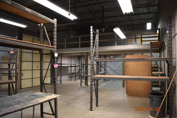 a view of a room with racks on the wall