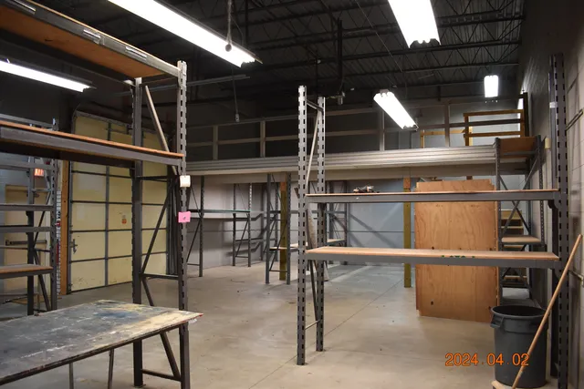 a view of a room with racks on the wall