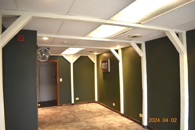 a front view of a house with a garage