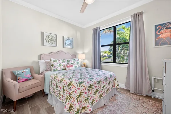 a bedroom with a bed and a couch