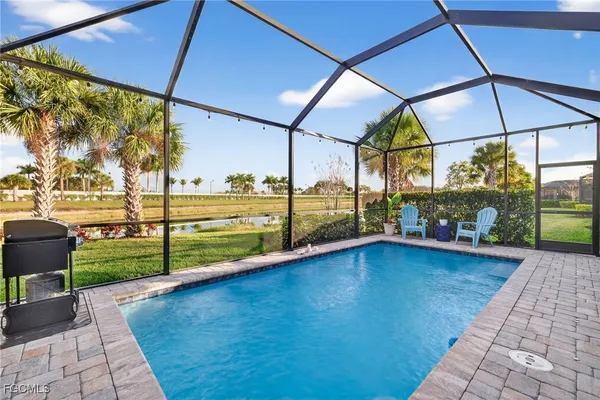 a view of a swimming pool with a porch