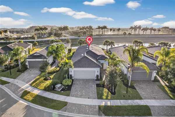 a view of a lake with a building in the background