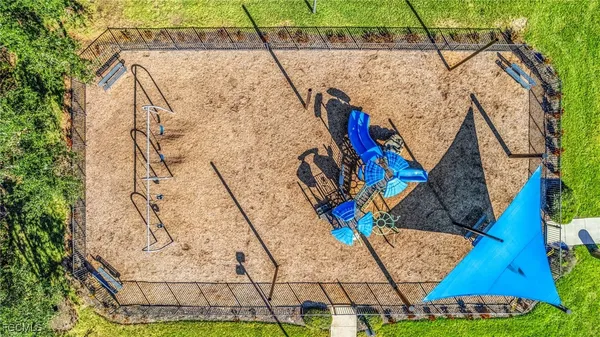 a view of backyard with sitting area