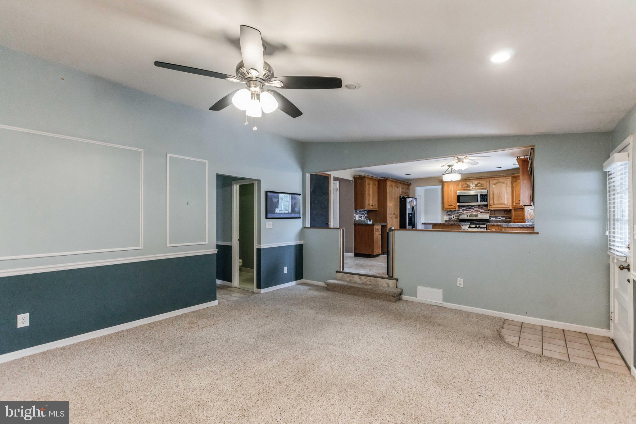 19 Candlestick Road Clementon, NJ 08021 - Photo 14 of 32 a view of a livingroom with furniture and chandelier fan