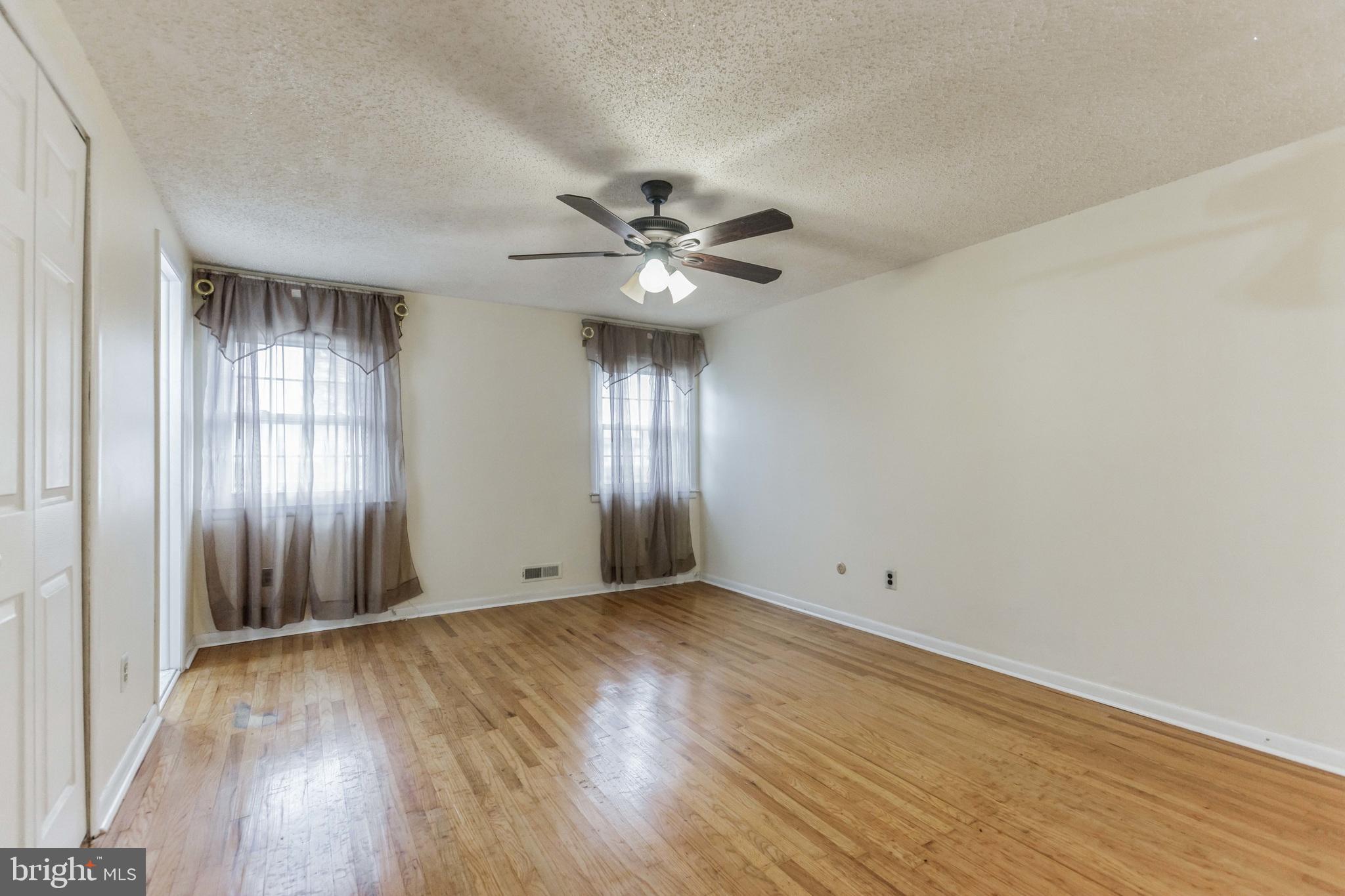 19 Candlestick Road Clementon, NJ 08021 - Photo 20 of 32 wooden floor in an empty room with a window