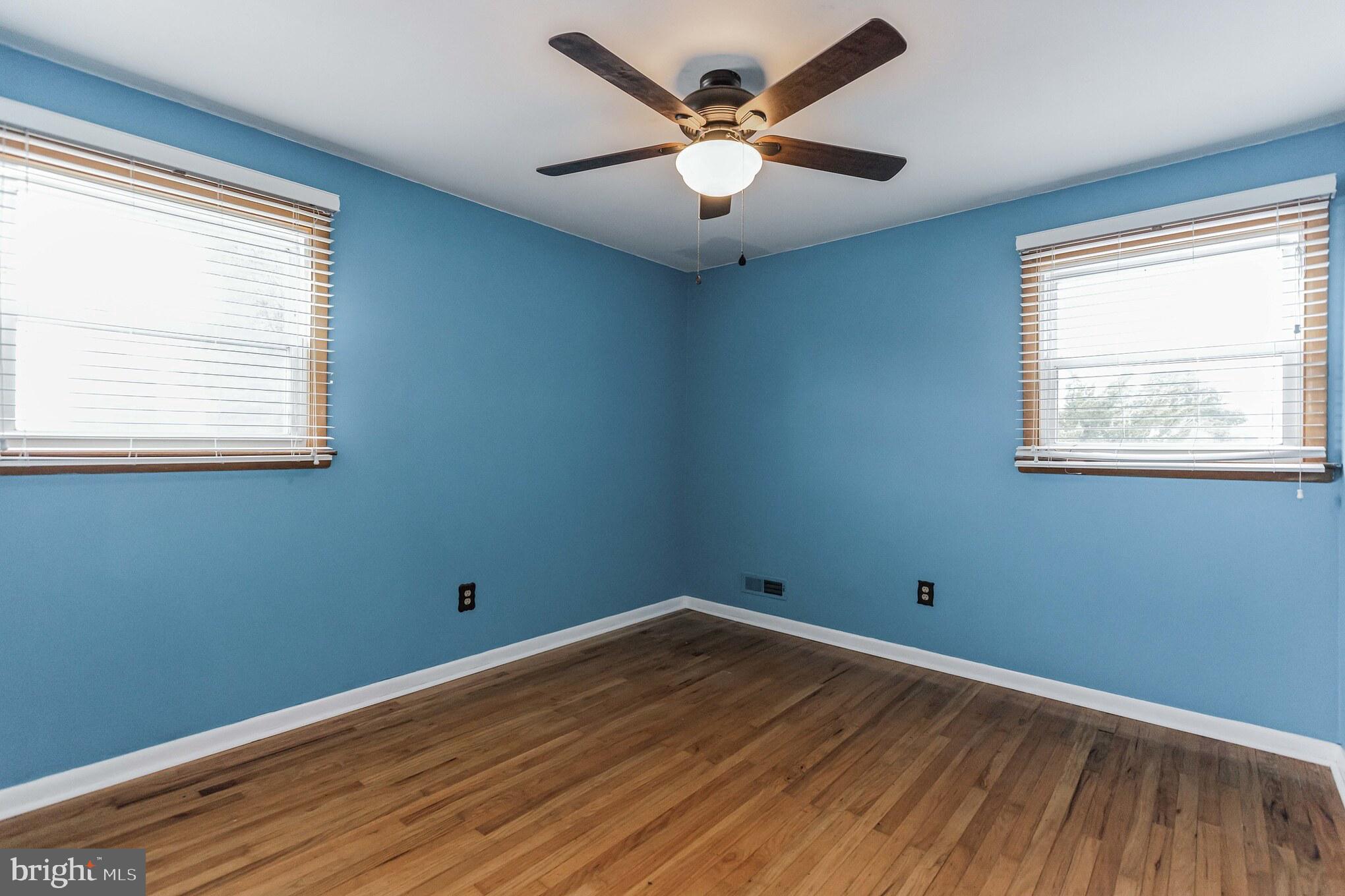 19 Candlestick Road Clementon, NJ 08021 - Photo 25 of 32 wooden floor in an empty room with a window