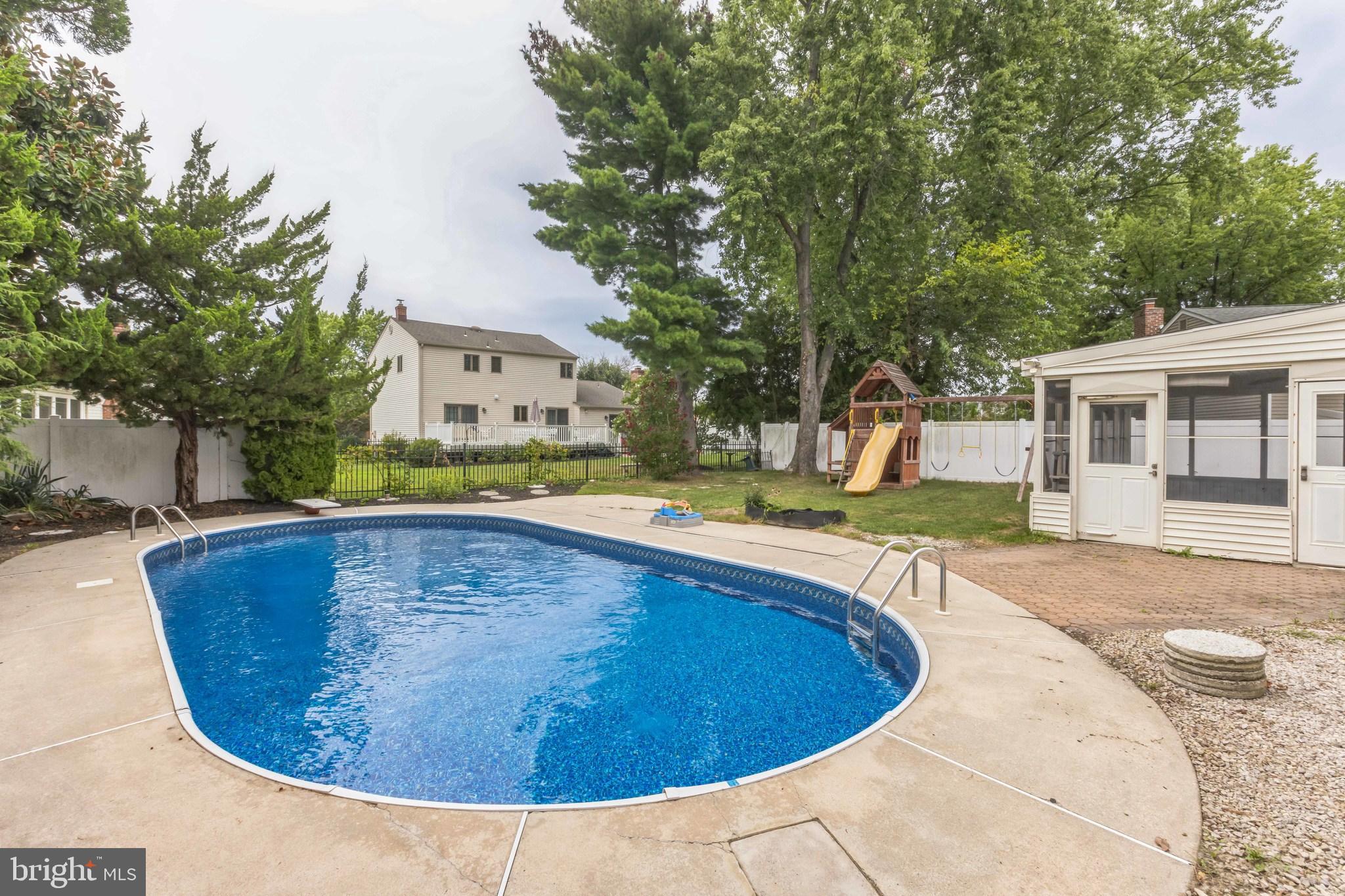 19 Candlestick Road Clementon, NJ 08021 - Photo 30 of 32 a view of a swimming pool with a patio