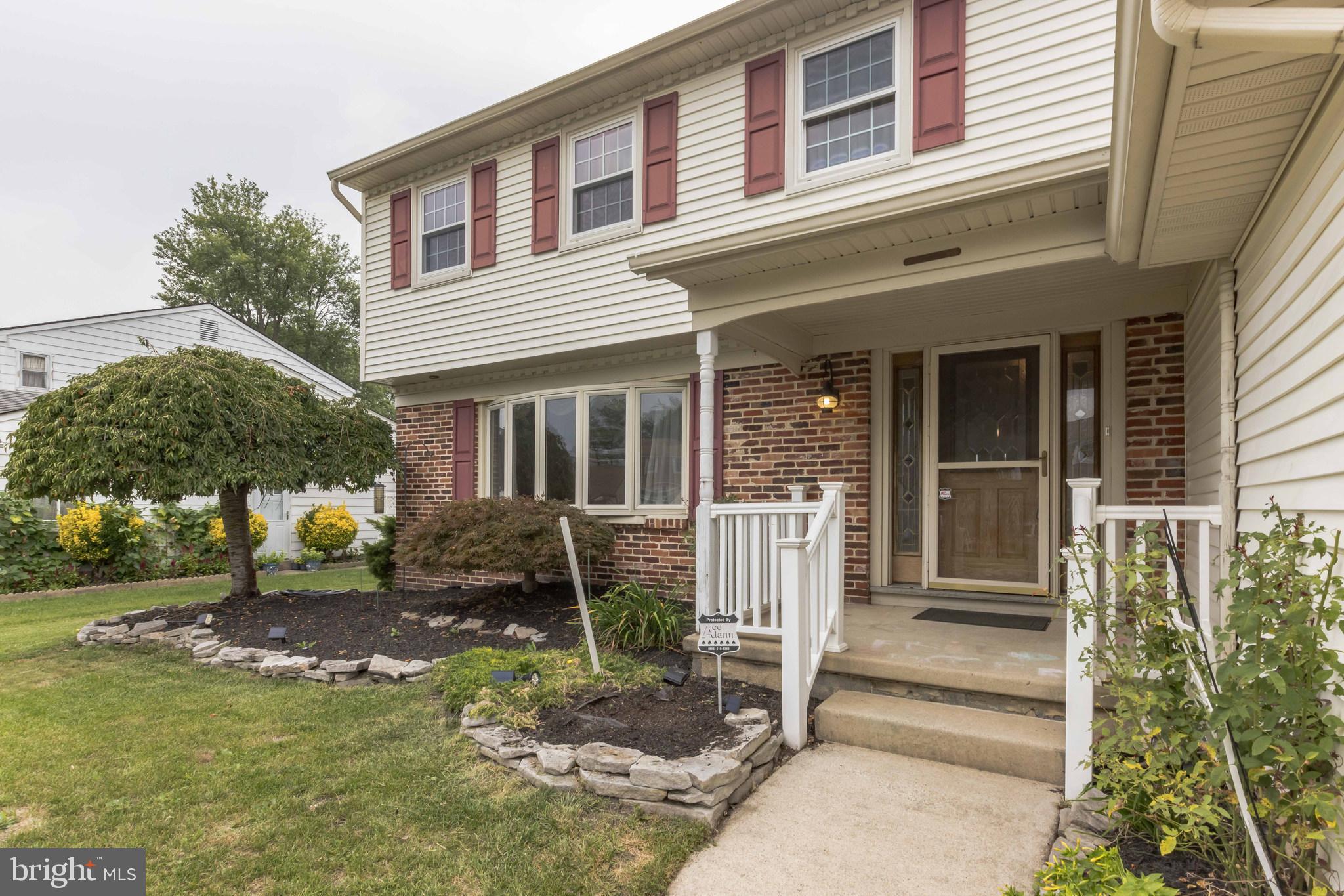 19 Candlestick Road Clementon, NJ 08021 - Photo 5 of 32 a front view of a house with a garden