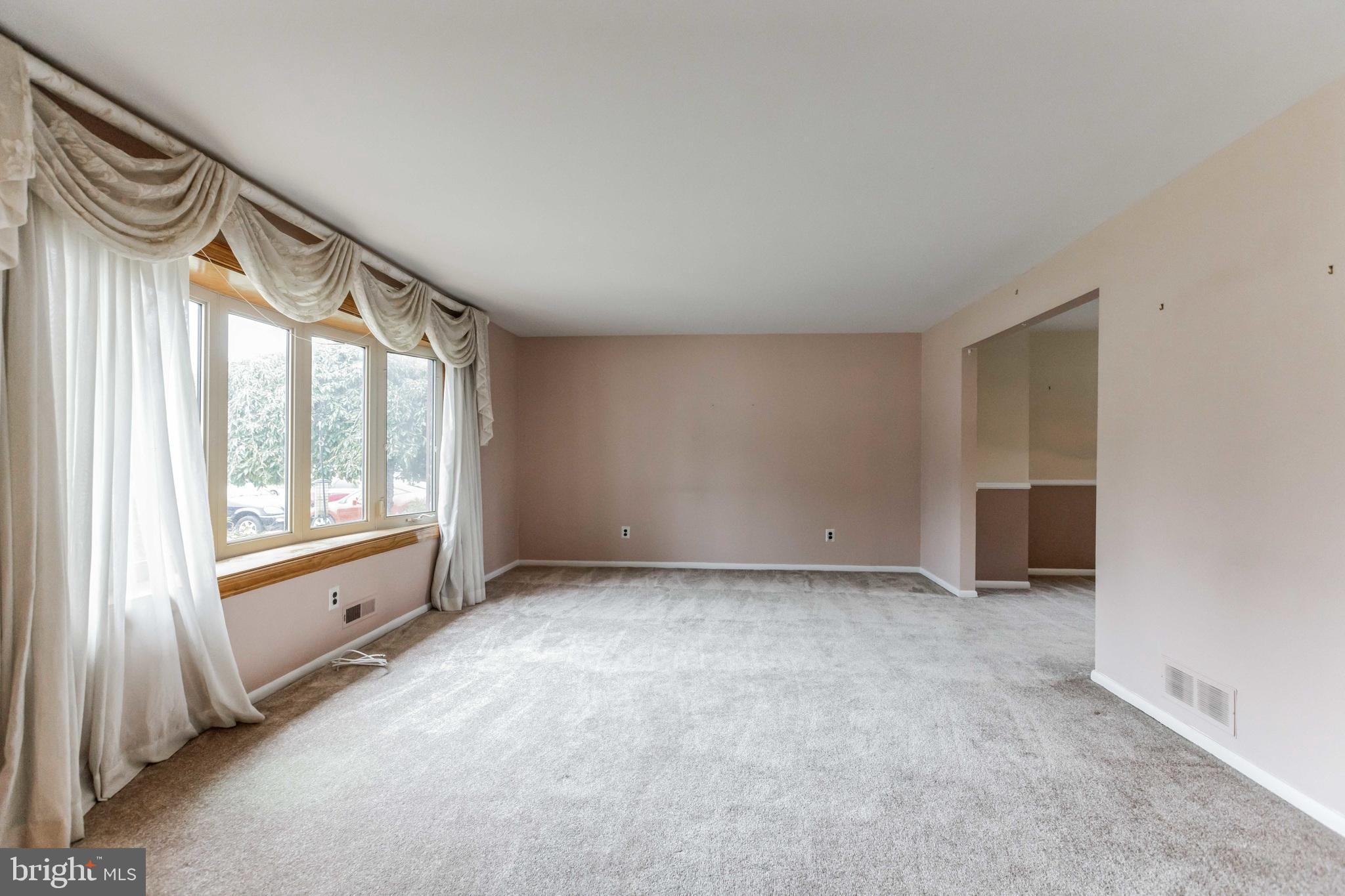 19 Candlestick Road Clementon, NJ 08021 - Photo 7 of 32 a view of an empty room with a window