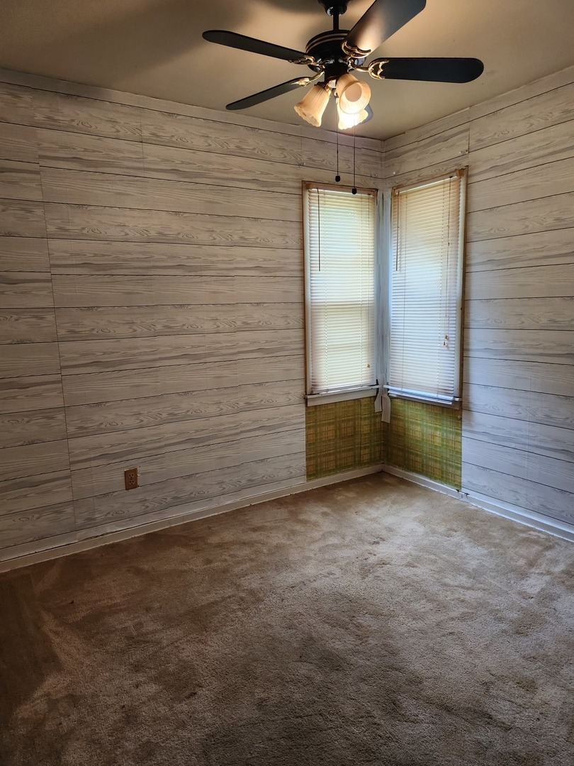 1228 20th Street North Chicago, IL 60064 - Photo 11 of 14 en empty room with window