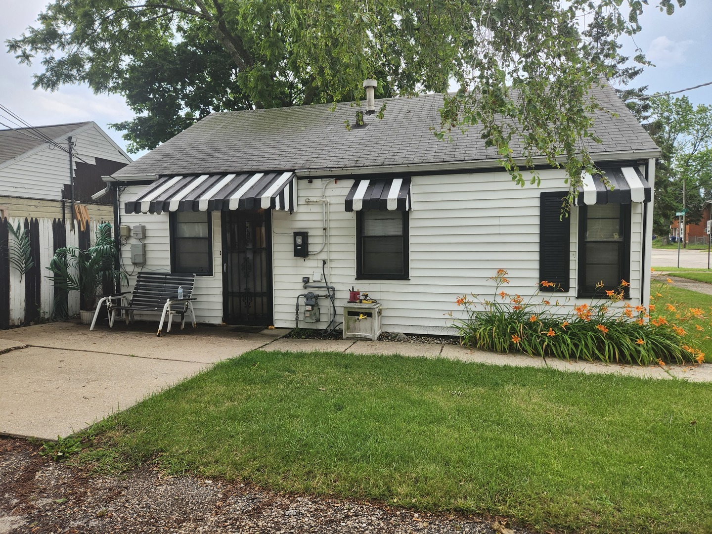 1228 20th Street North Chicago, IL 60064 - Photo 3 of 14 a view of a house with backyard and sitting area