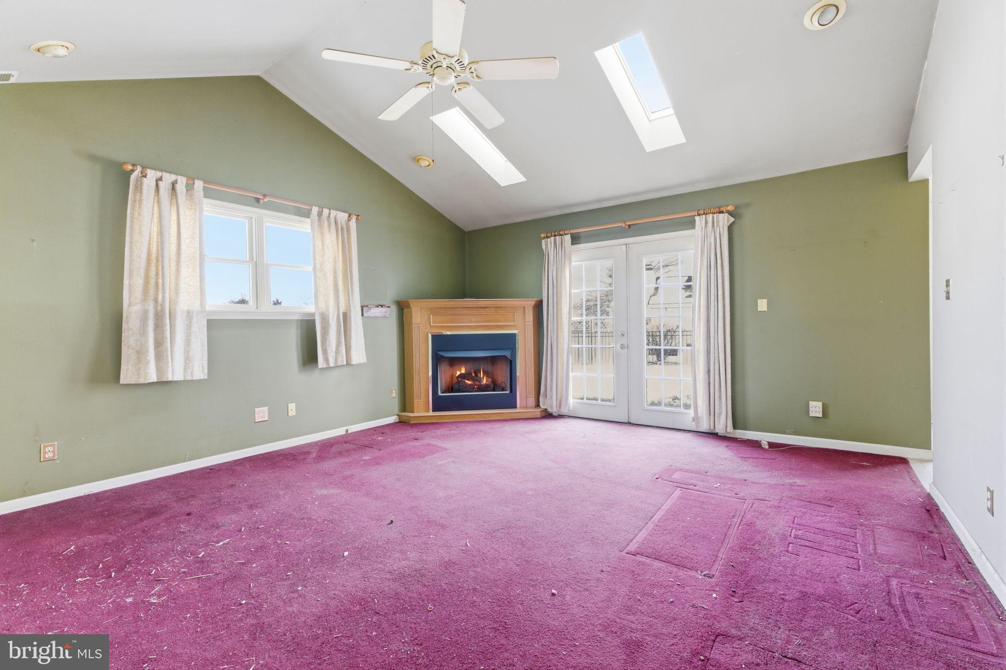 1997 Brook Lane Jamison, PA 18929 - Photo 2 of 19 an empty room with windows and fireplace