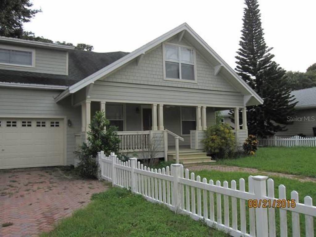 215 2nd Avenue Southwest Largo, FL 33770 - Photo 1 of 1 Remodeled 1920 Florida style home-complete with brick pavers and picket fence!