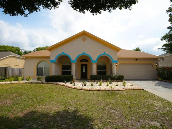 a front view of house with yard