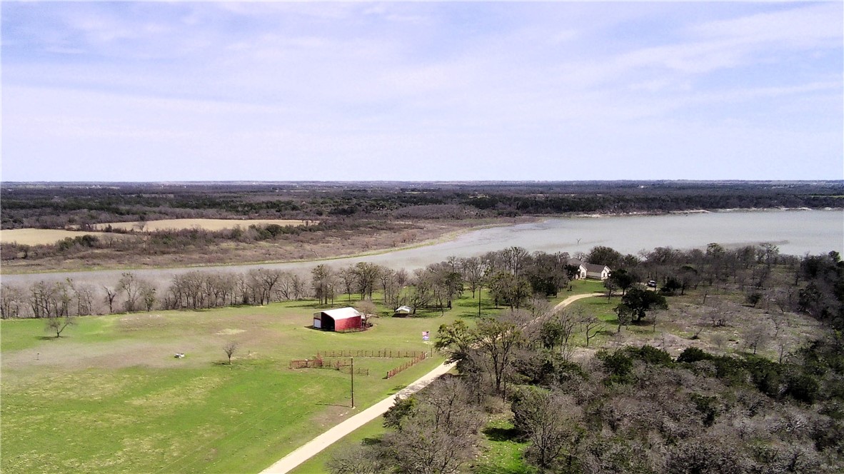 17452 Deer Ridge Road Moody, TX 76557 - Photo 14 of 60 a view of a lake with houses in the back