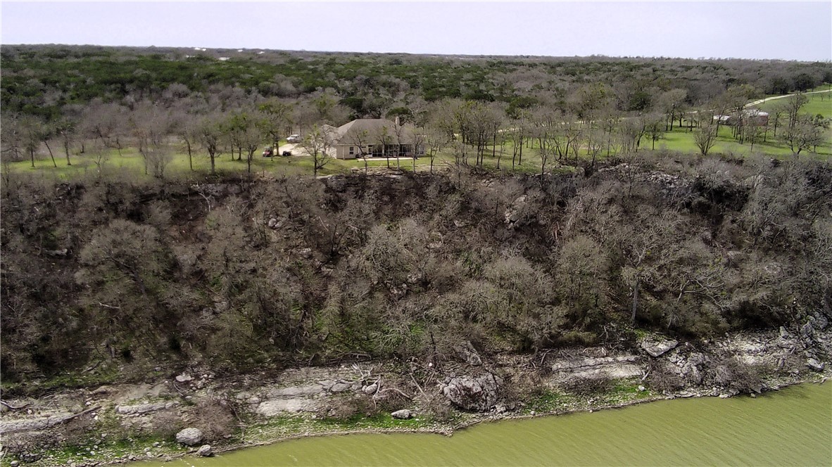 17452 Deer Ridge Road Moody, TX 76557 - Photo 5 of 60 a view of a lake with green valley