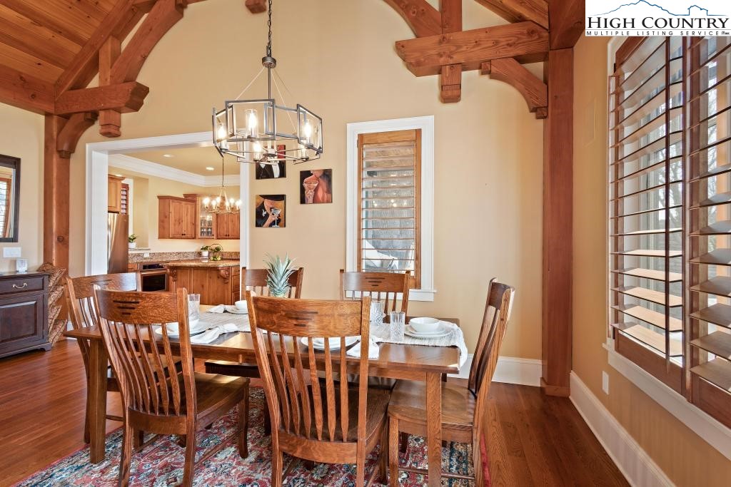 766 Turtle Creek Drive, Unit 3A Boone, NC 28607 - Photo 11 of 46 a view of a dining room with furniture window and wooden floor