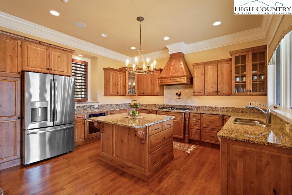 766 Turtle Creek Drive, Unit 3A Boone, NC 28607 - Photo 12 of 46 a kitchen with stainless steel appliances granite countertop a sink stove and refrigerator