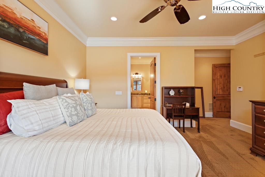 766 Turtle Creek Drive, Unit 3A Boone, NC 28607 - Photo 18 of 46 a bedroom with a bed and wooden floor
