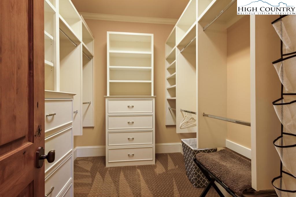 766 Turtle Creek Drive, Unit 3A Boone, NC 28607 - Photo 21 of 46 a view of walk in closet with clothes