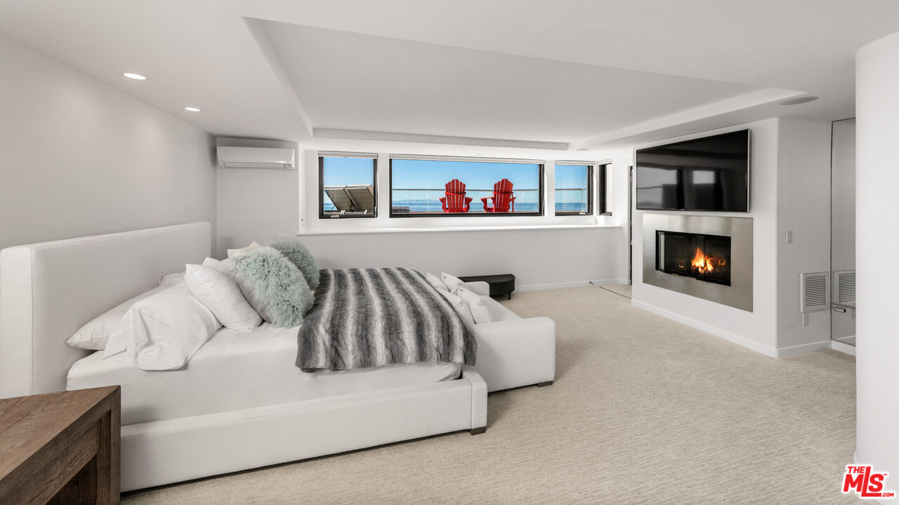 3461 Ocean Drive Oxnard, CA 93035 - Photo 11 of 30 a living room with furniture and a fireplace