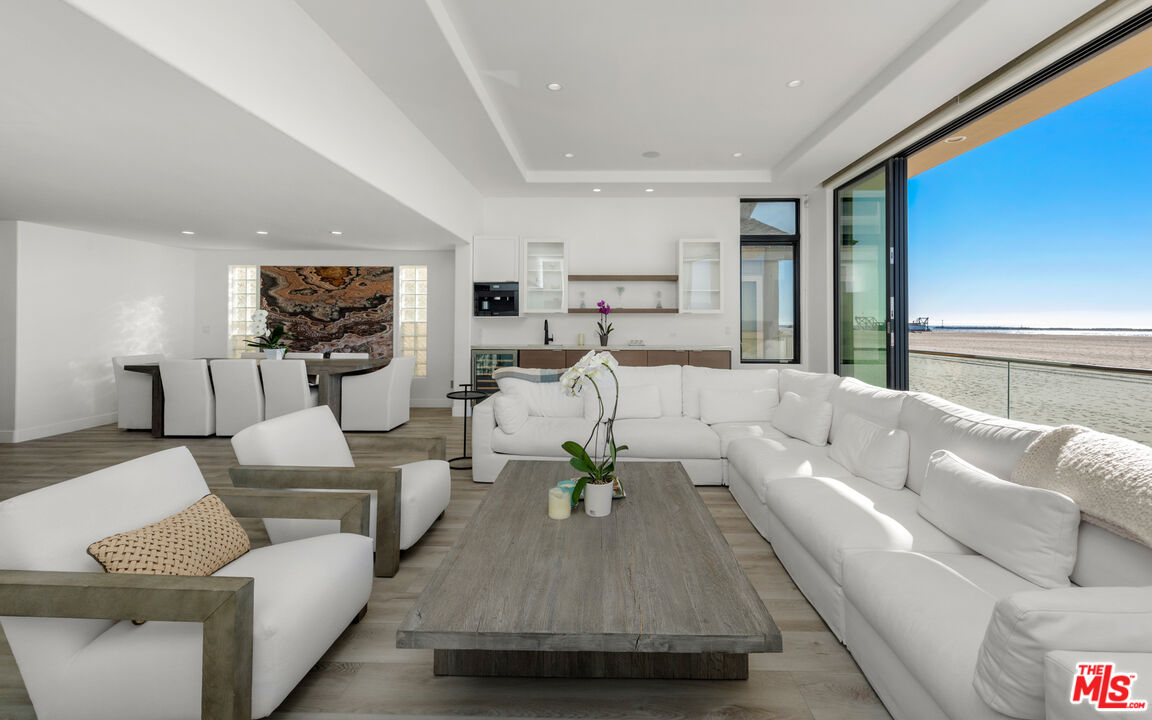 3461 Ocean Drive Oxnard, CA 93035 - Photo 5 of 30 a living room with furniture and a large window