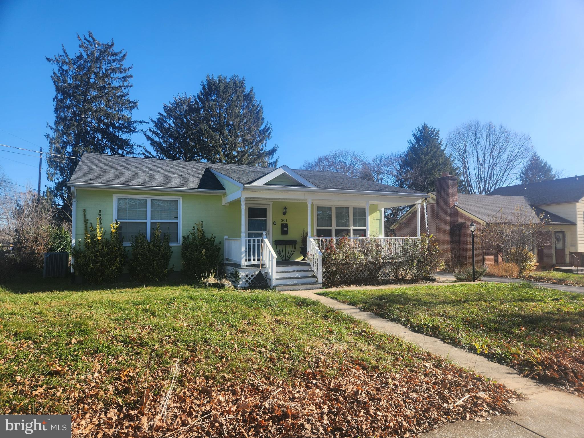 501 South Seminary Street Charles Town, WV 25414 - Photo 1 of 18 a front view of a house with a yard and porch