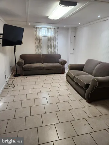 a living room with a couch and a coffee table