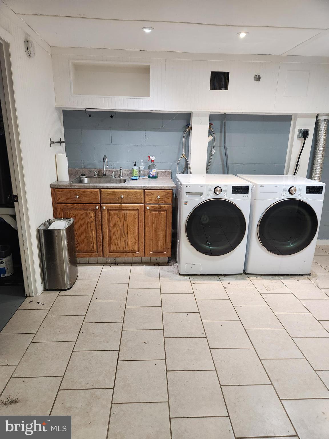 501 South Seminary Street Charles Town, WV 25414 - Photo 17 of 18 a room with a washing machine and cabinets