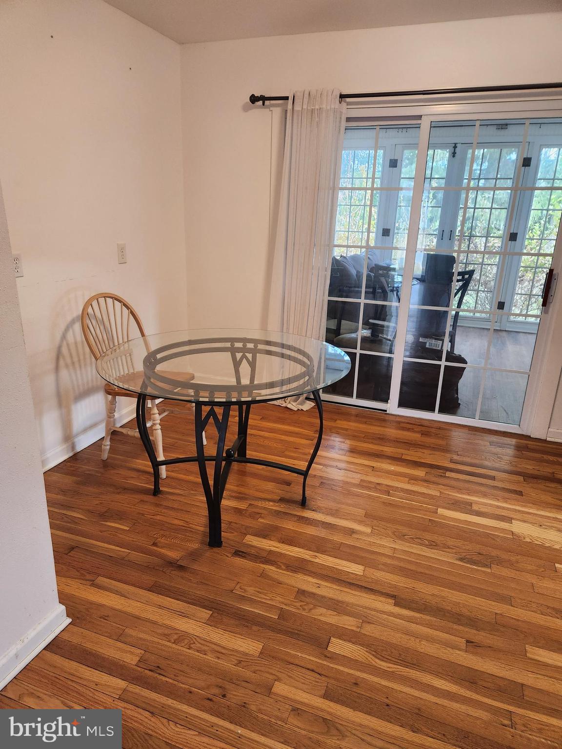 501 South Seminary Street Charles Town, WV 25414 - Photo 5 of 18 a view of a room with furniture wooden floor and window