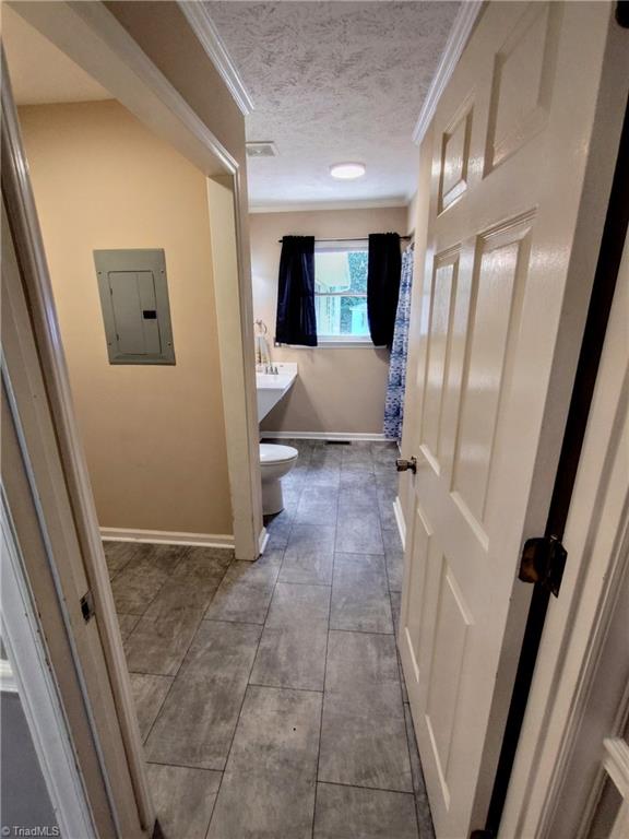 820 Hillcrest Drive Rockingham, NC 28379 - Photo 14 of 50 Hall bathroom with main laundry