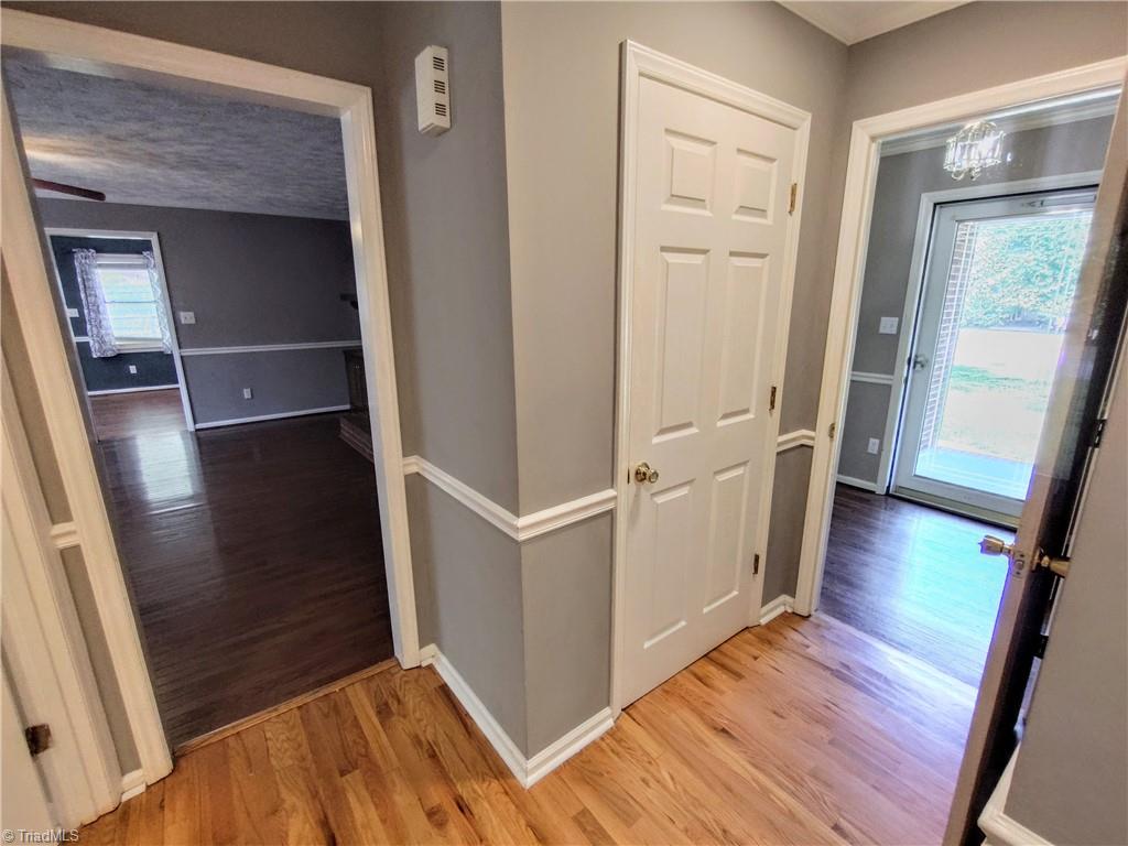 820 Hillcrest Drive Rockingham, NC 28379 - Photo 19 of 50 Hallway outside of hall bathroom into foyer with closet