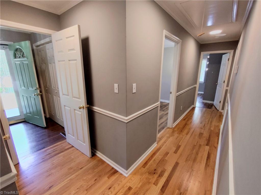 820 Hillcrest Drive Rockingham, NC 28379 - Photo 20 of 50 Hallway outside of hall bathroom into foyer with closet