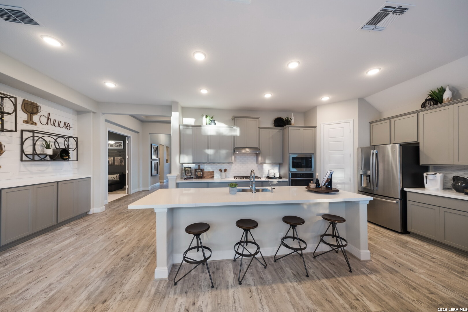 417 Fandango Boerne, TX 78006 - Photo 13 of 37 a large kitchen with a table and chairs