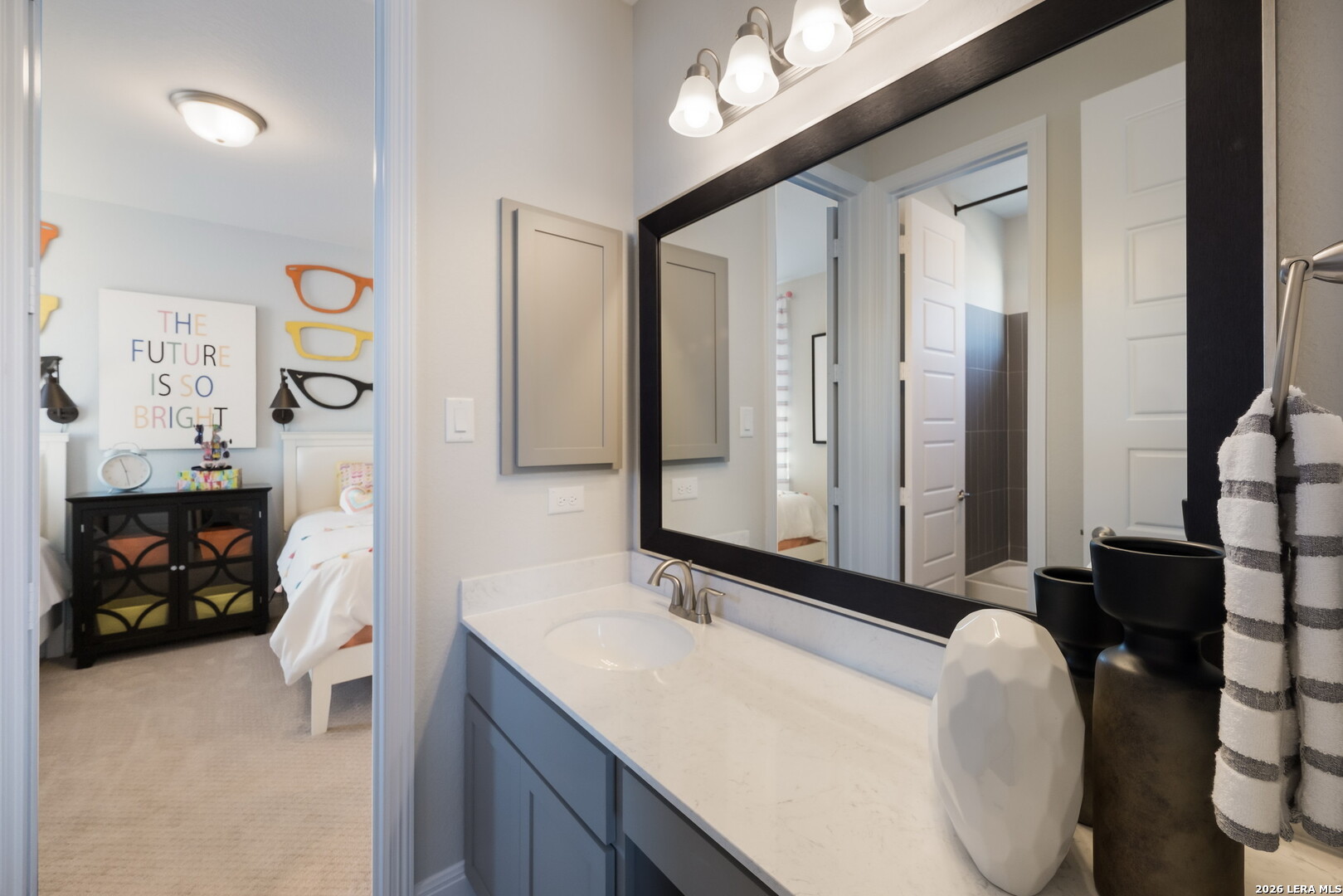 417 Fandango Boerne, TX 78006 - Photo 21 of 37 a bathroom with a granite countertop sink and a mirror