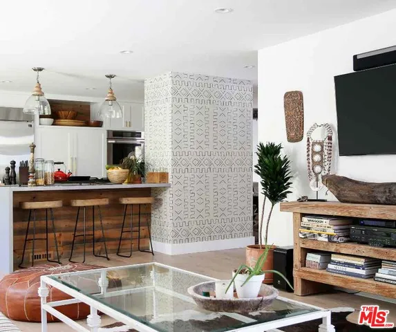 a kitchen with counter top space and appliances