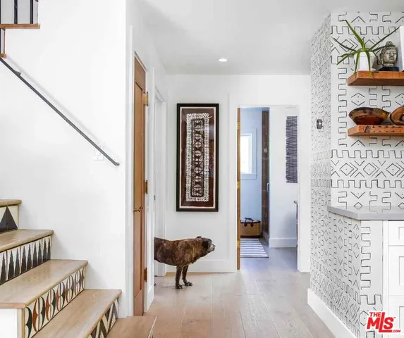 a view of livingroom with furniture and workspace