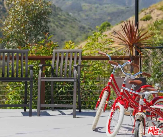 a living room with furniture fireplace and a flat screen tv